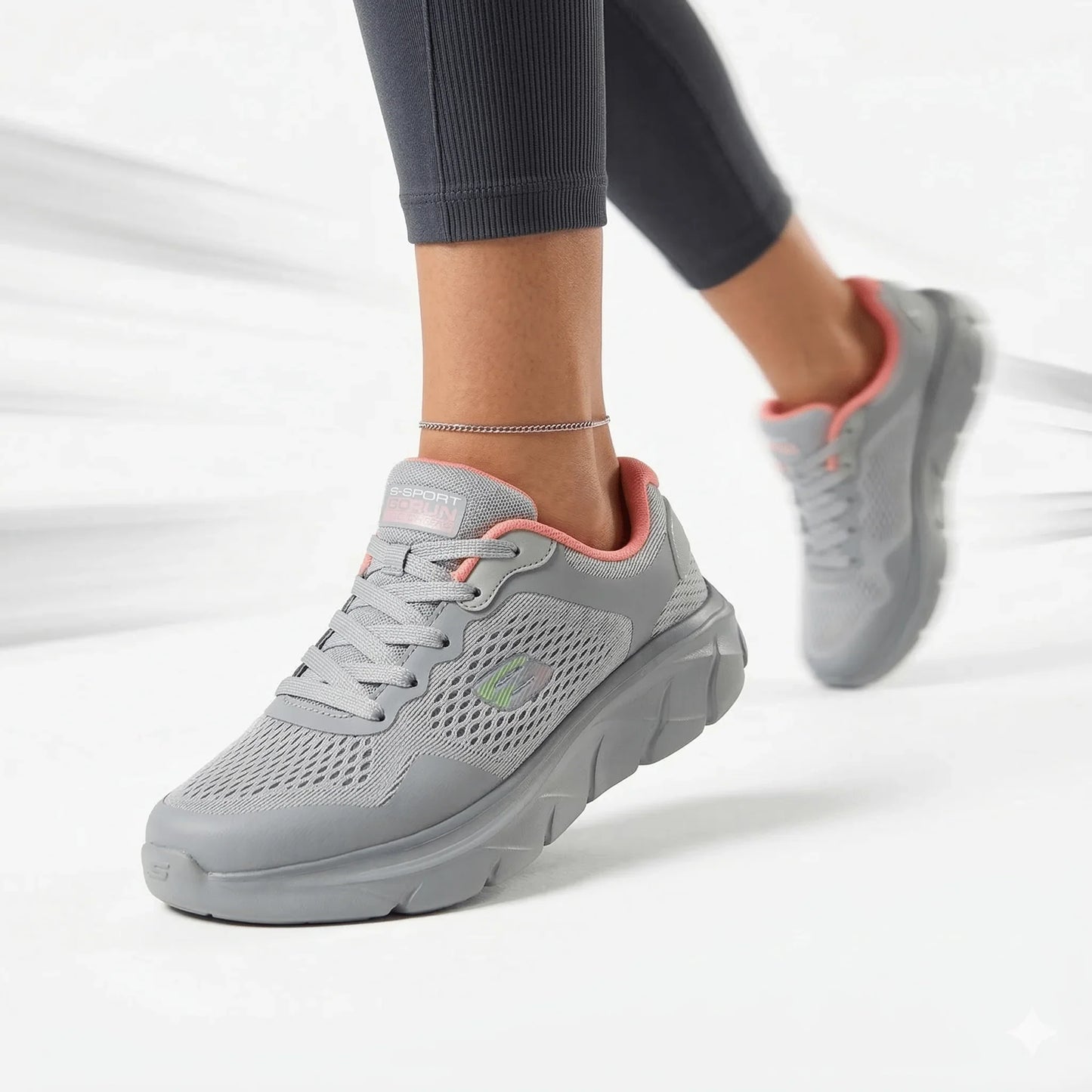 BAJO SHOES Chaussures de Sport Femme gris avec accent rose – portées en marche avec leggings gris – semelle médicale ergonomique – respirantes légères – BAJO SHOES